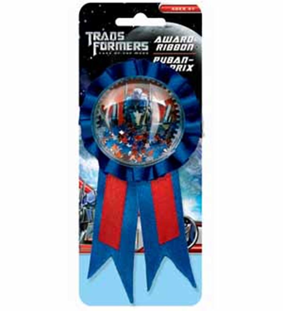 Round Transformers medal with red and blue ribbons and confetti inside clear dome.