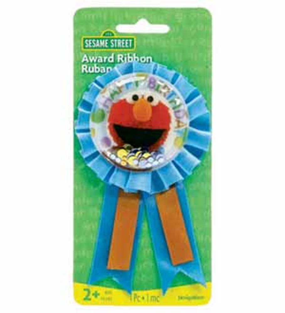 Blue pleated award ribbon with Elmo confetti pouch center, orange ribbon tails, on green backing card.