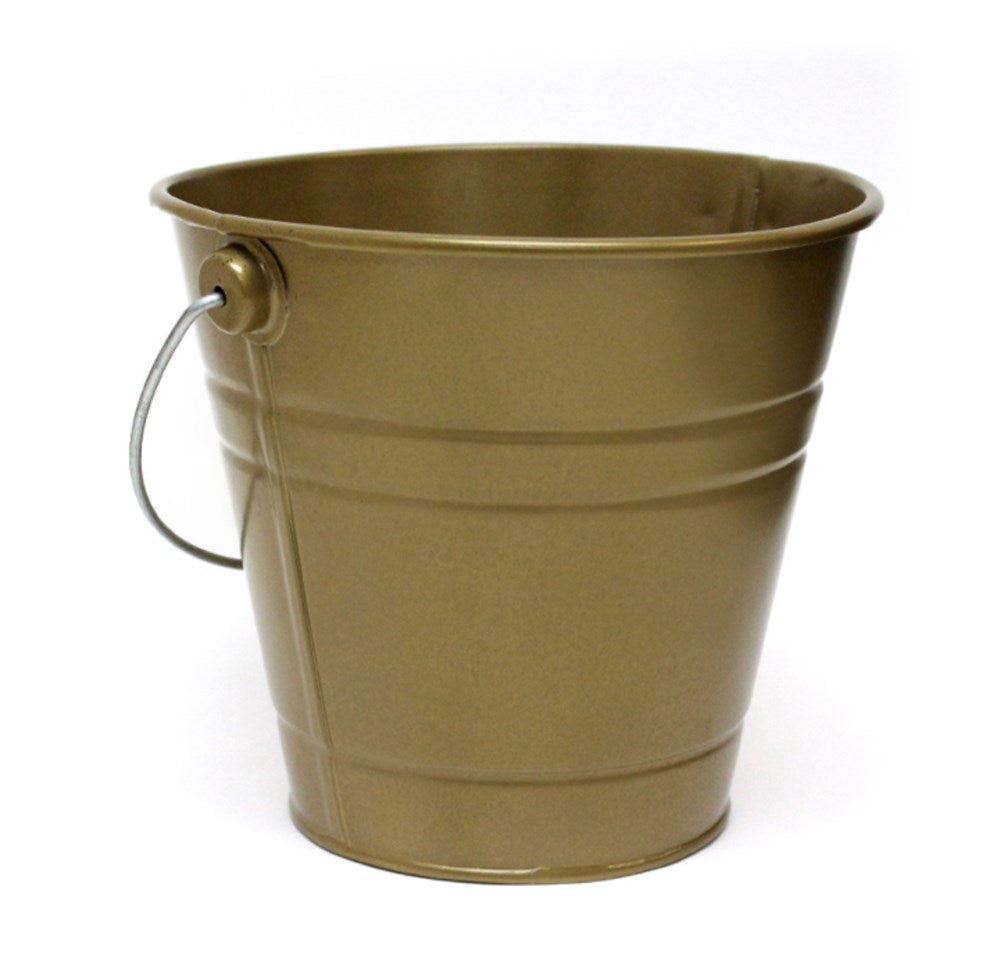 Small gold metal bucket with smooth finish and wire handle on white background.