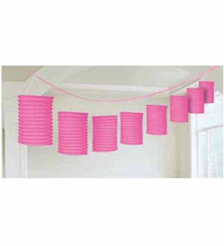 Bright pink paper lantern garland with eight round lanterns strung on a 12ft pink cord.