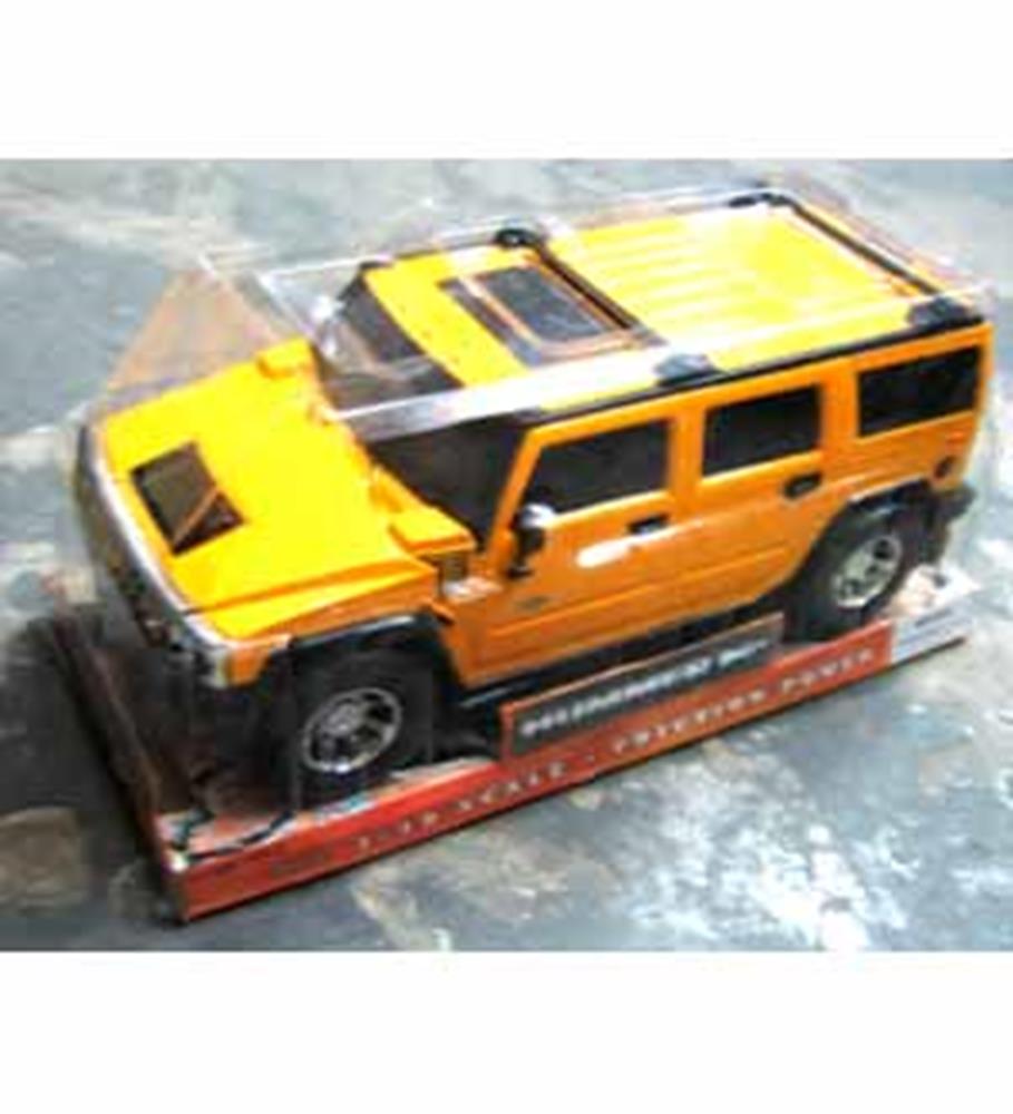 Yellow friction-powered toy Hummer H2 with black detailing and realistic SUV design.