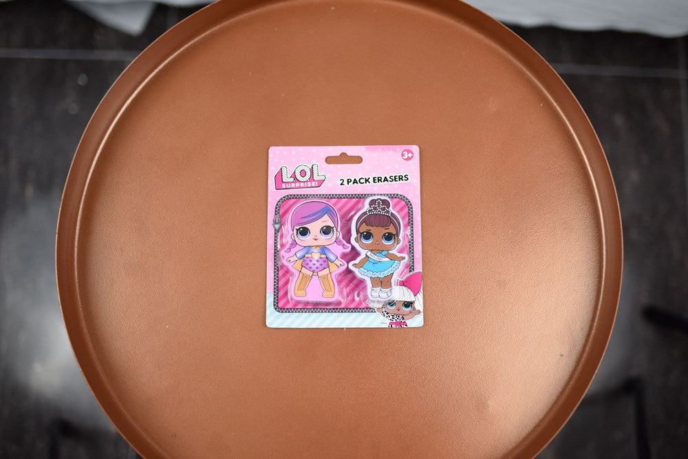 Two LOL Surprise character erasers in pink and blue packaging with cartoon designs.