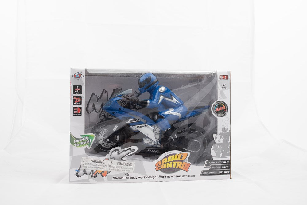 Blue and black remote control motorcycle toy with rider figure in racing suit inside white display box.