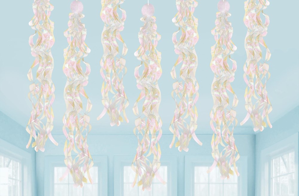 Ten iridescent hanging swirl decorations with a luminous, pearl-like finish, twisting vertically in soft pastel colors.