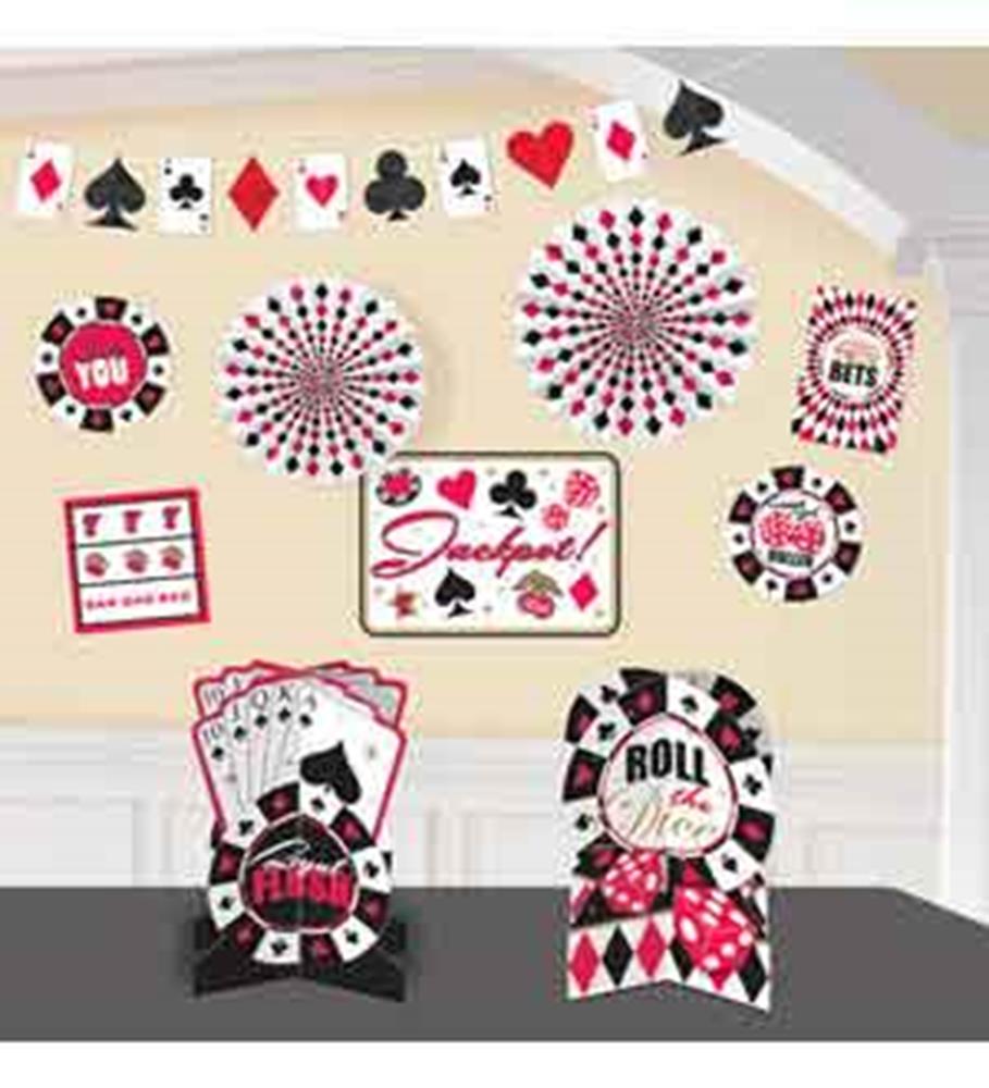 Casino-themed party kit with playing card and poker chip decorations in red, black, and white.