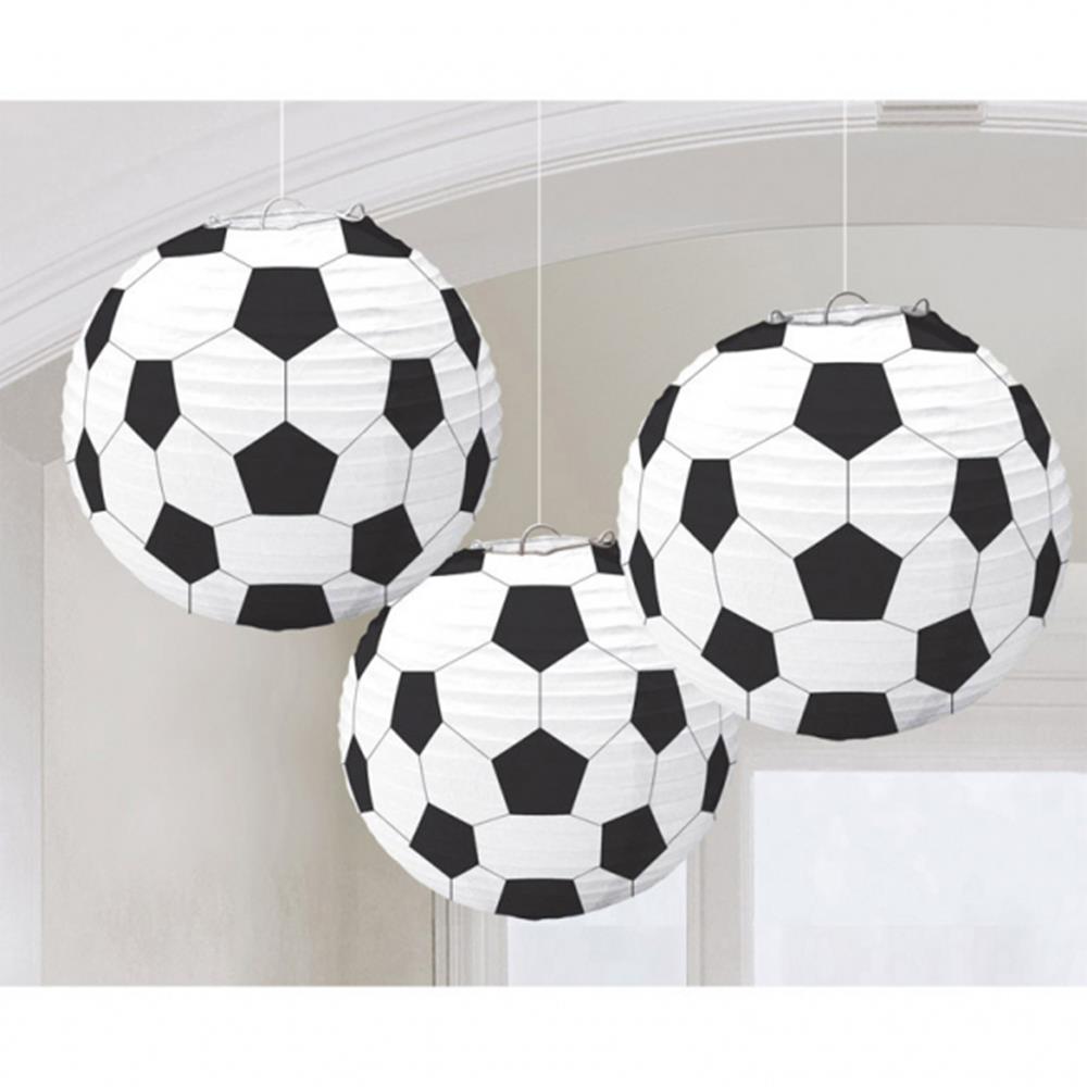 Set of three round white paper lanterns printed with black pentagon and hexagon soccer ball pattern.