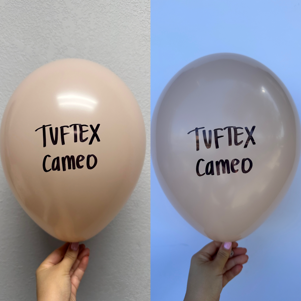 Pair of 24 inch latex balloons in nude and pale pink shades, both with Tuftex Cameo logo printed in black.