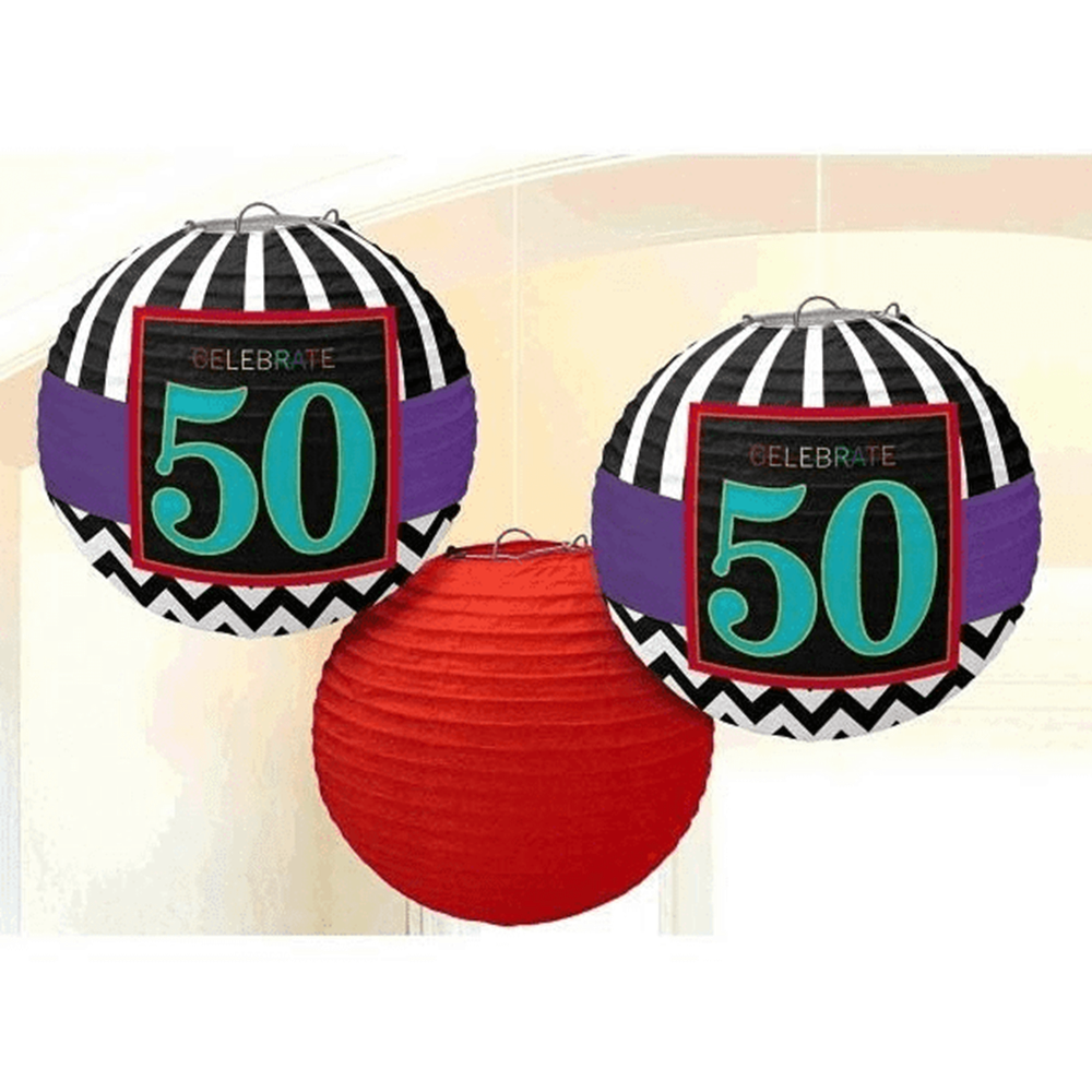 Black paper lanterns with teal "50" and purple stripes, paired with a solid red paper lantern.