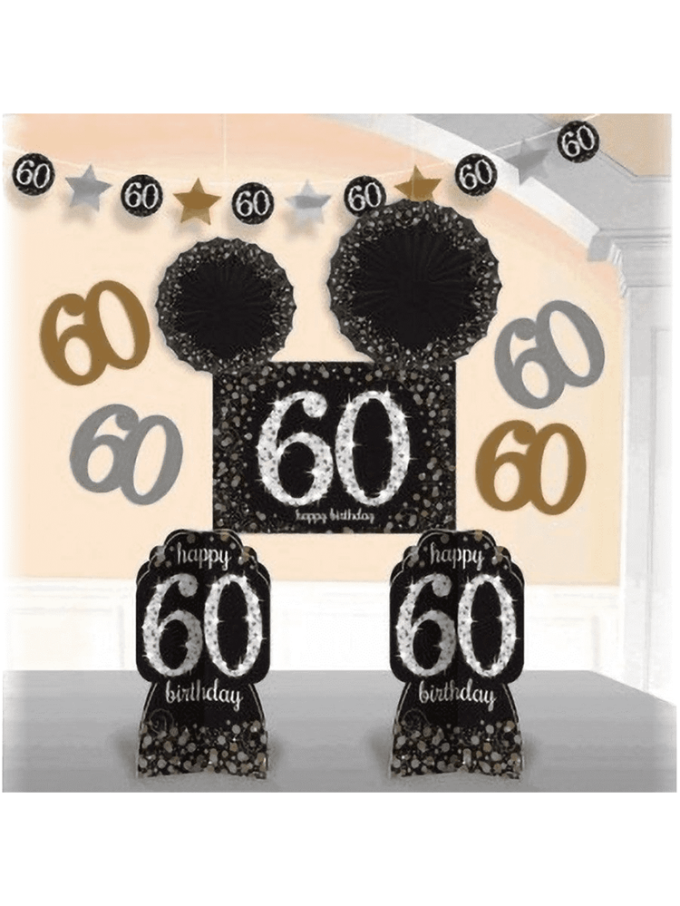 Black glittery "60" birthday centerpiece with Mickey Mouse ears and matching hanging decorations on orange background.