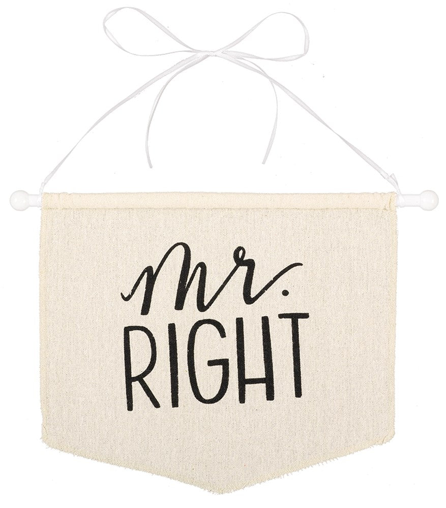 Beige canvas banner with black handwritten-style text "mr. RIGHT" and white hanging string.
