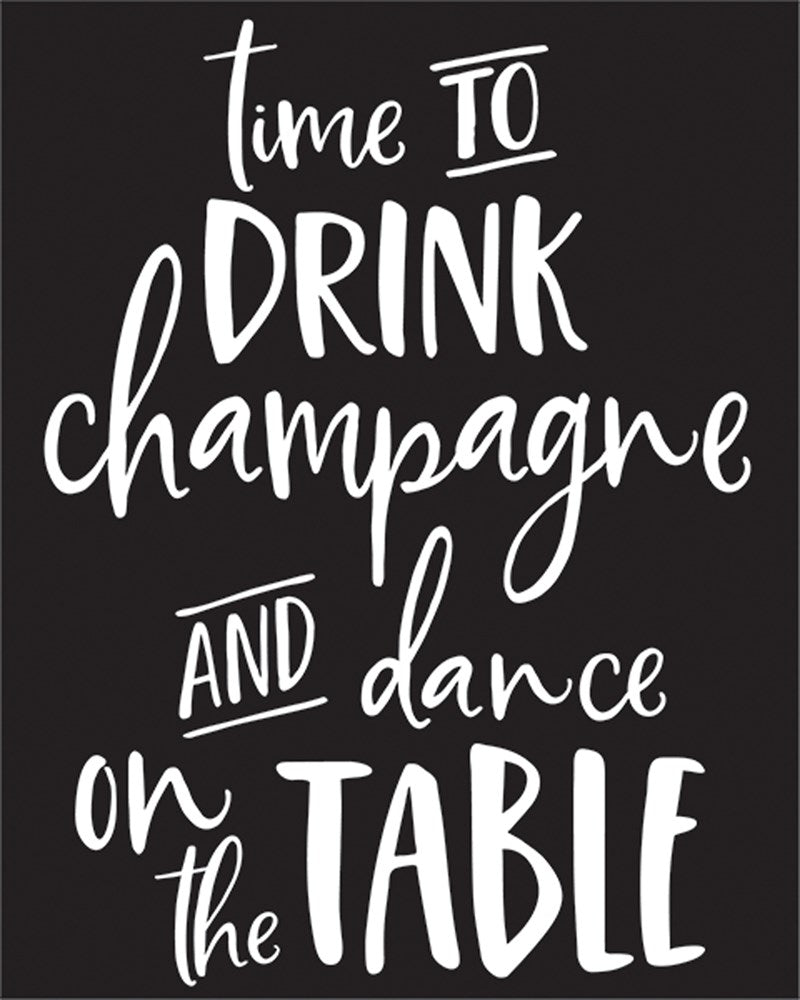 Black MDF chalkboard sign with white handwritten-style text reading "time to drink champagne and dance on the table".