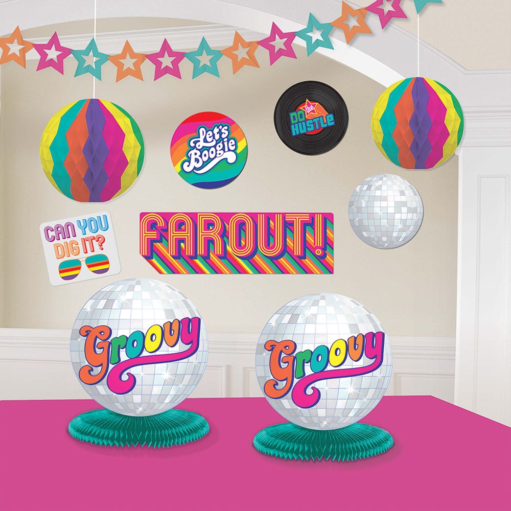 Colorful star garland, rainbow-striped hanging paper balls, disco ball decor, "Far Out!" banner, and groovy disco ball table