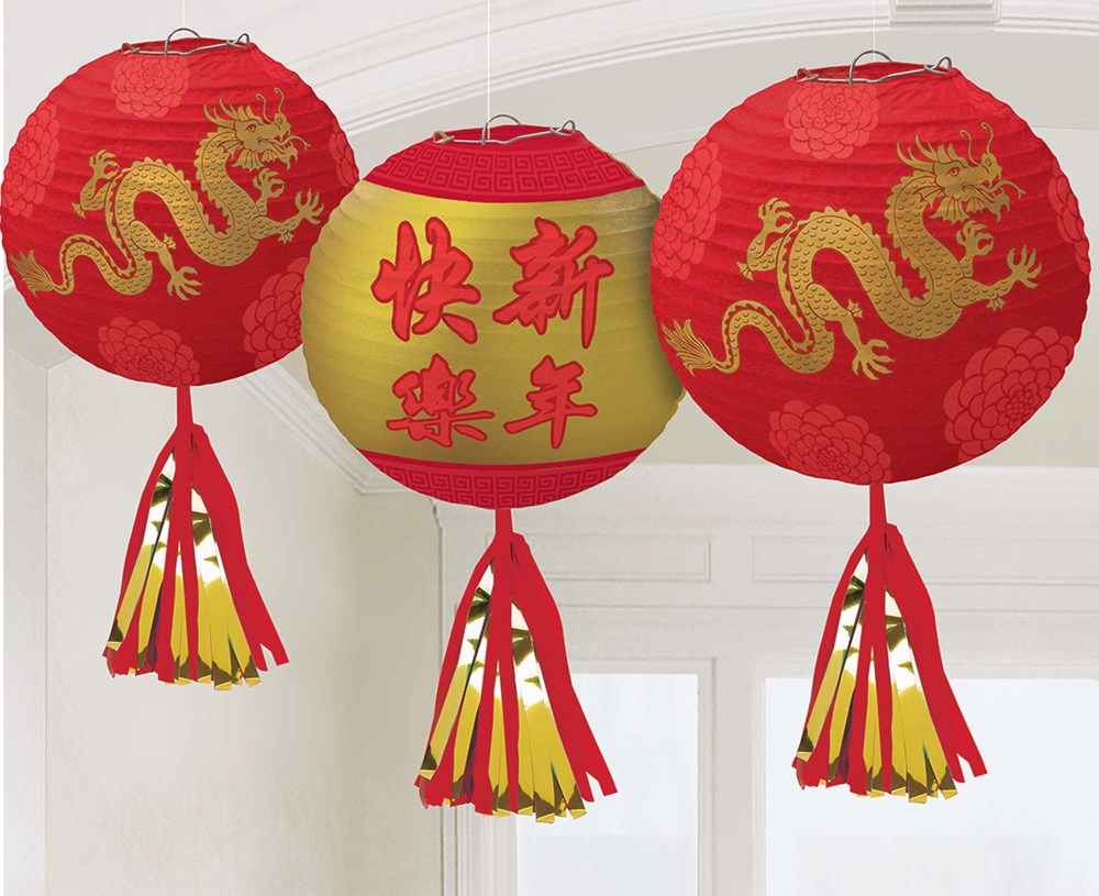 Three round paper lanterns in red and gold with gold dragon designs and Chinese characters, each with red and gold tassels.