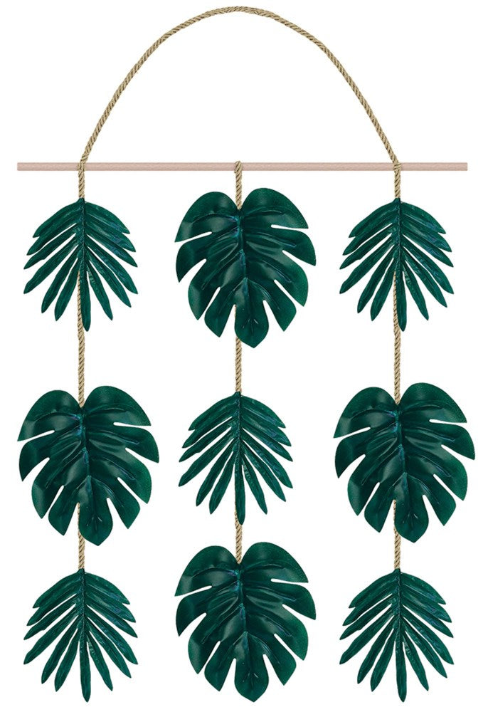 Green faux palm leaves hanging from natural twine on a wooden rod wall decor.