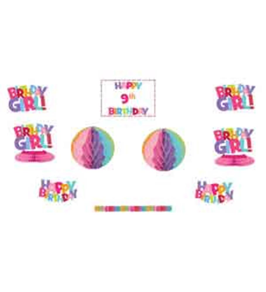 Colorful "Brady Girl" themed birthday decorations including cupcake toppers, "Happy 9th Birthday" sign, two multicolored.