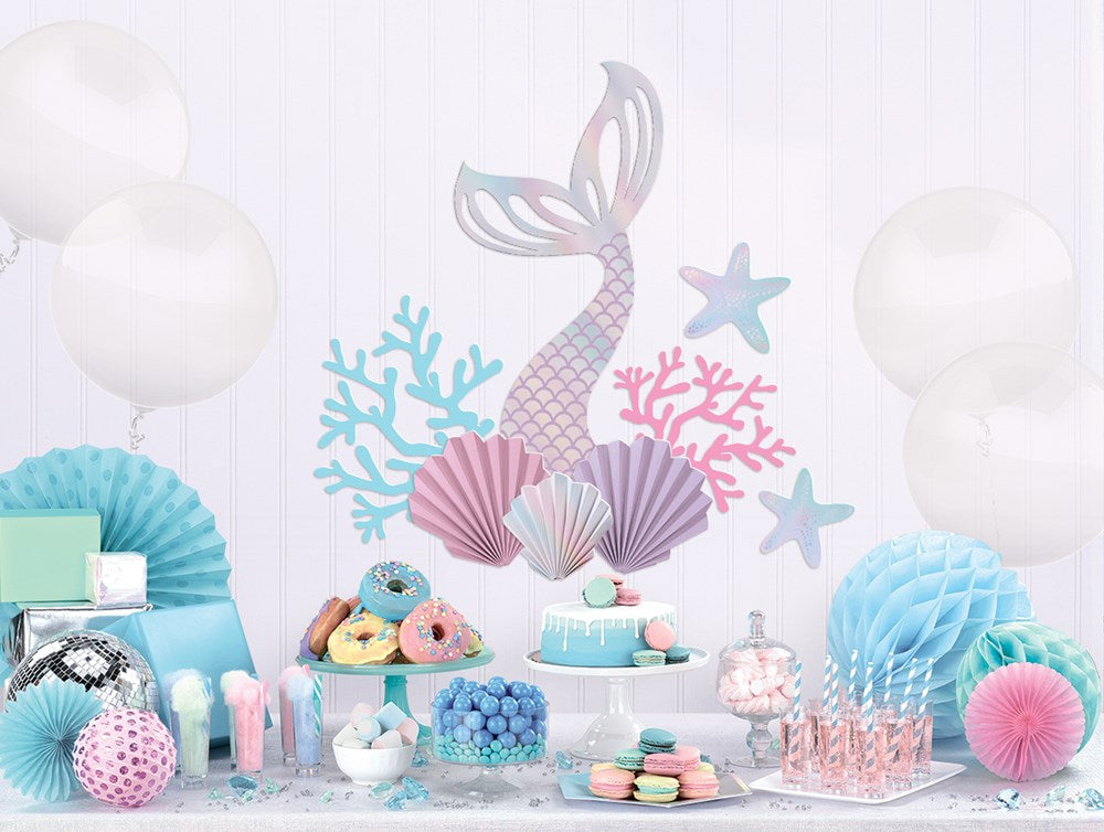 Decorative wall kit with pastel pink and purple mermaid tail, blue and pink coral, and a purple starfish backdrop for party.