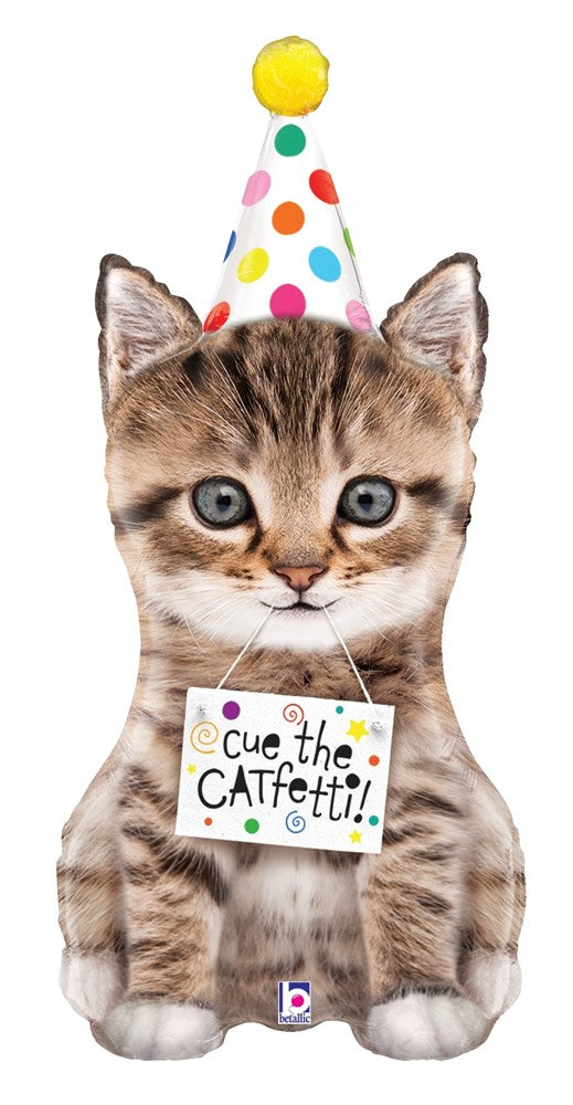 36-inch foil balloon shaped like a gray tabby kitten wearing a white party hat with colorful dots and holding a sign that.