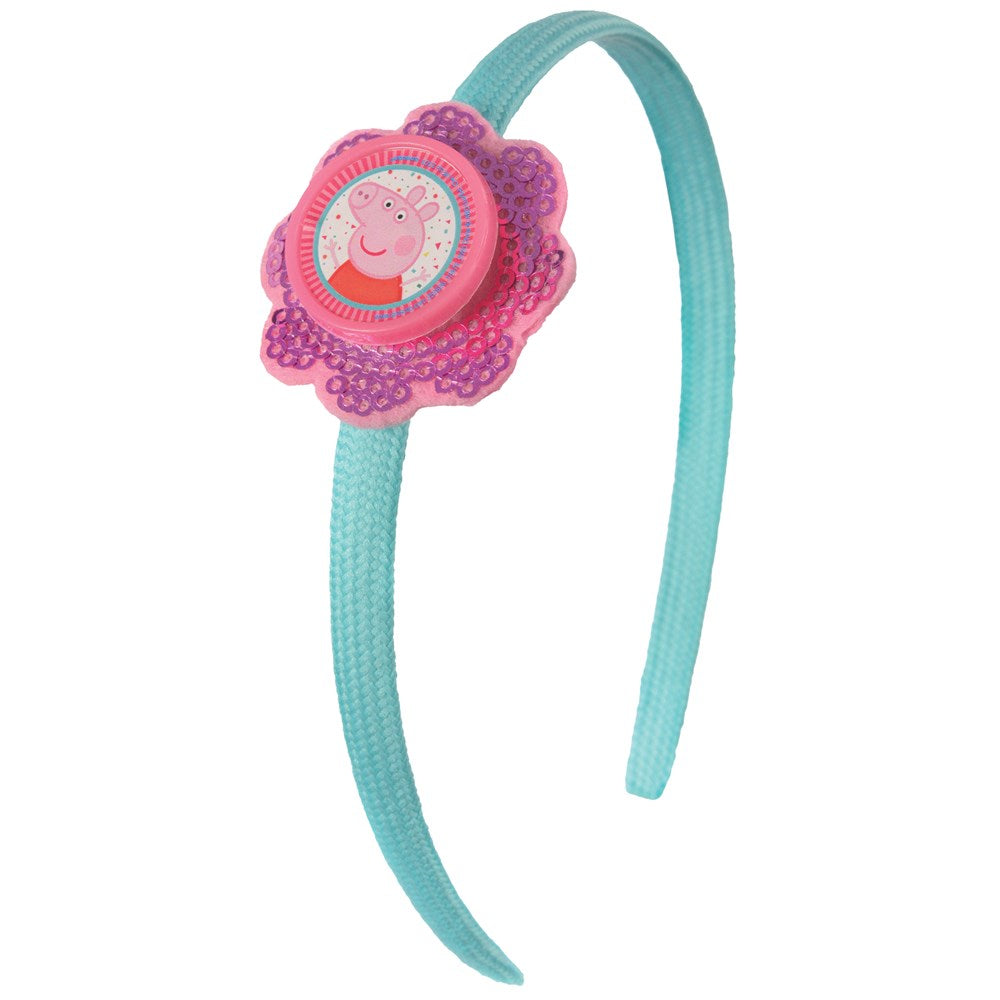 Light blue plastic headband with a pink flower-shaped decoration featuring Peppa Pig illustration in the center.