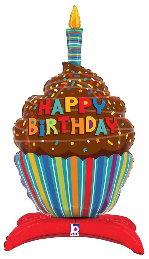 Brown foil birthday cupcake balloon with colorful sprinkles, striped base, lit blue candle, standing on red pedestal.