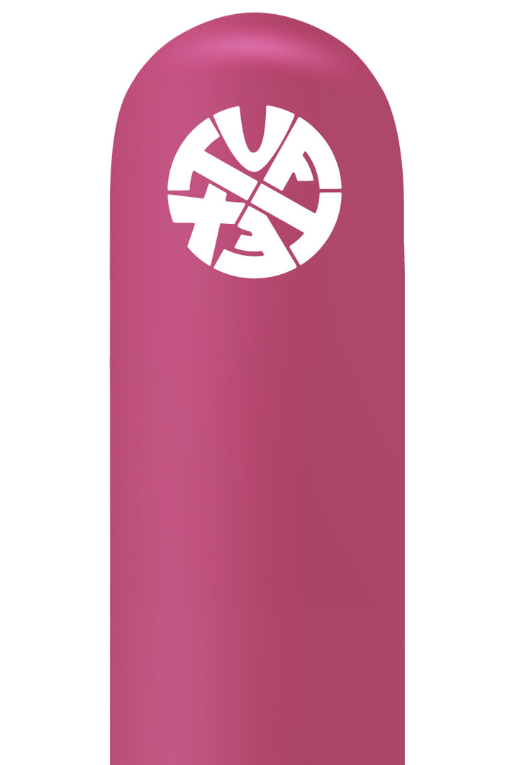 Bright magenta latex balloon with white Tuftex logo printed near the top.