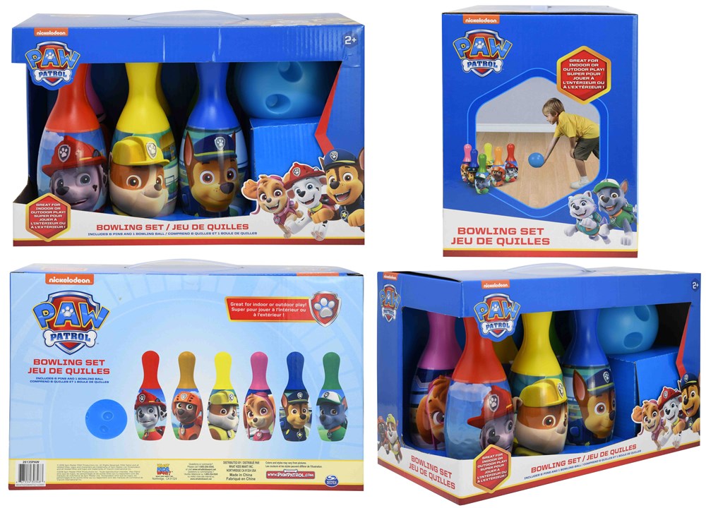 Colorful Paw Patrol-themed plastic bowling pins shaped like character heads in a blue display box with cartoon graphics and.