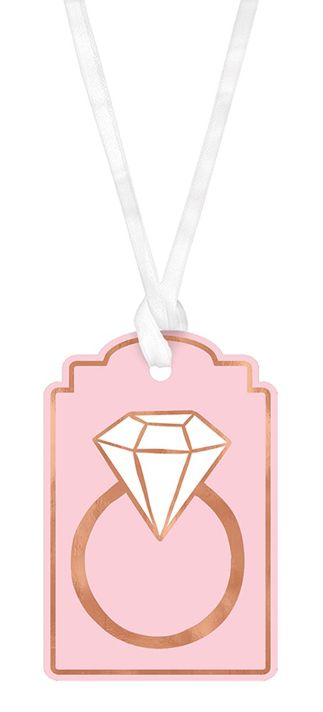 Blush pink rectangular tag with decorative cut edges, featuring a gold diamond ring illustration and a white ribbon loop.