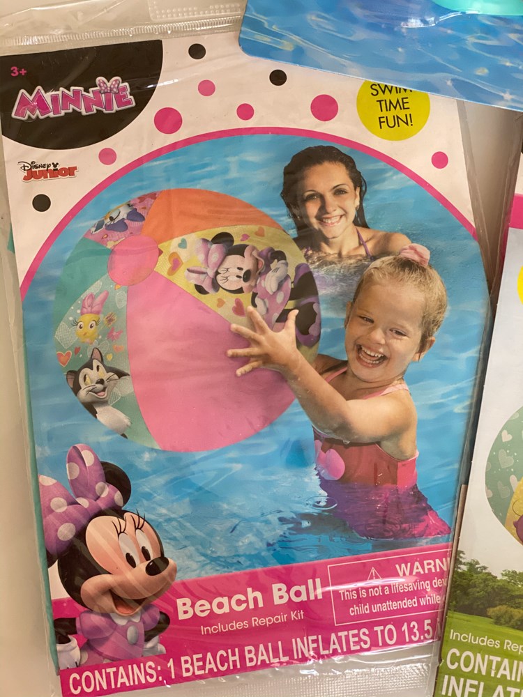 20-inch round inflatable beach ball with pink, white, and purple panels featuring Minnie Mouse designs.