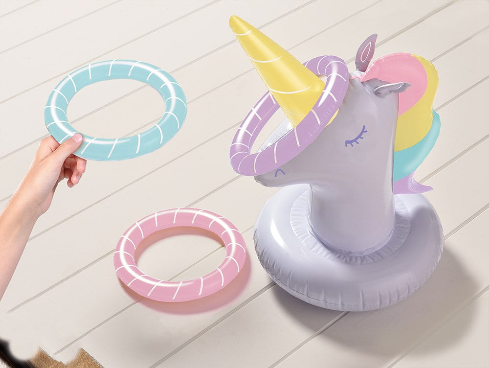Inflatable unicorn ring toss game with pastel purple horn, pink ears, multicolored mane, and three pastel rings.