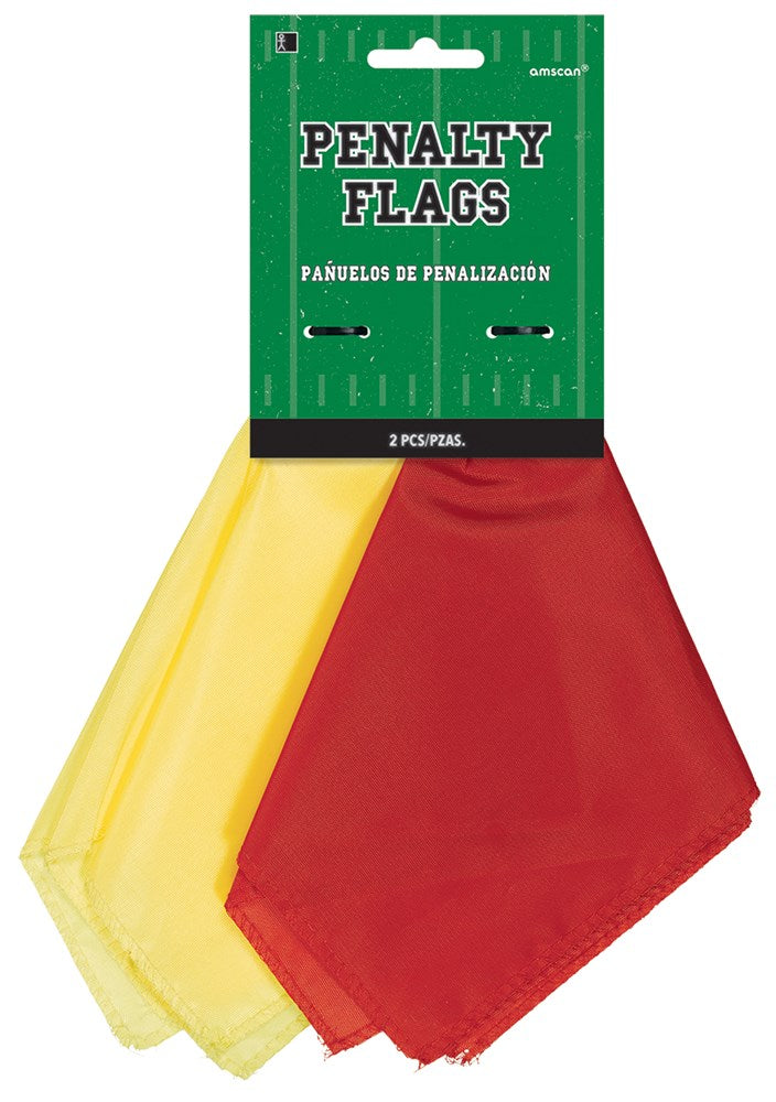 Set of bright yellow and red triangular football penalty flags with reinforced edges, hanging on a green cardboard backing.