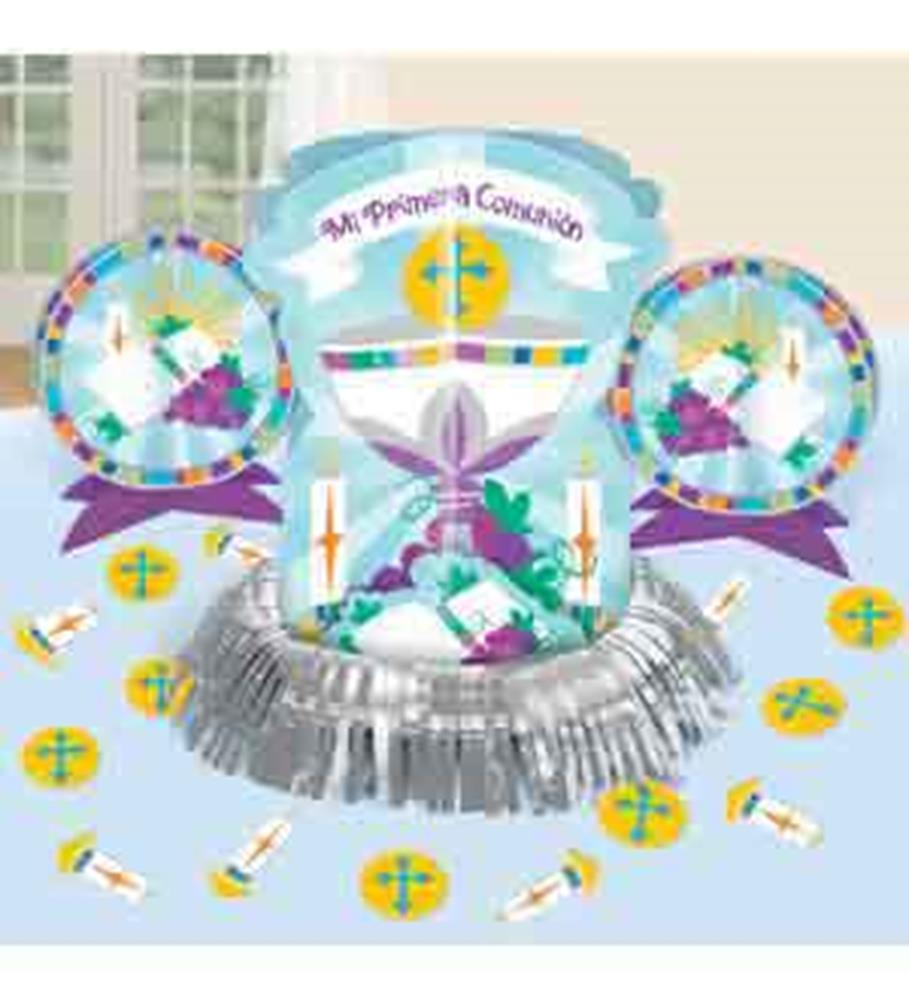 Communion-themed table centerpiece with candles, chalice illustration, silver fringe base, and colorful circular decorative.