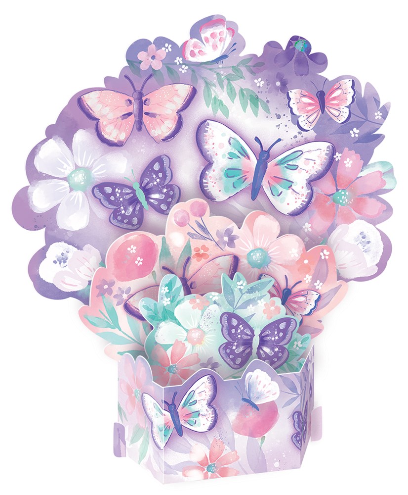 Colorful table decoration featuring pastel pink, purple, and white butterflies and flowers on paper cutouts.
