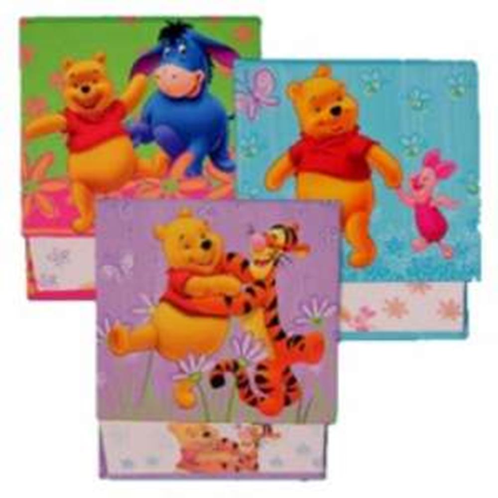Three Pooh-themed memo pads featuring colorful covers with Winnie the Pooh, Tigger, Eeyore, and Piglet illustrations on.