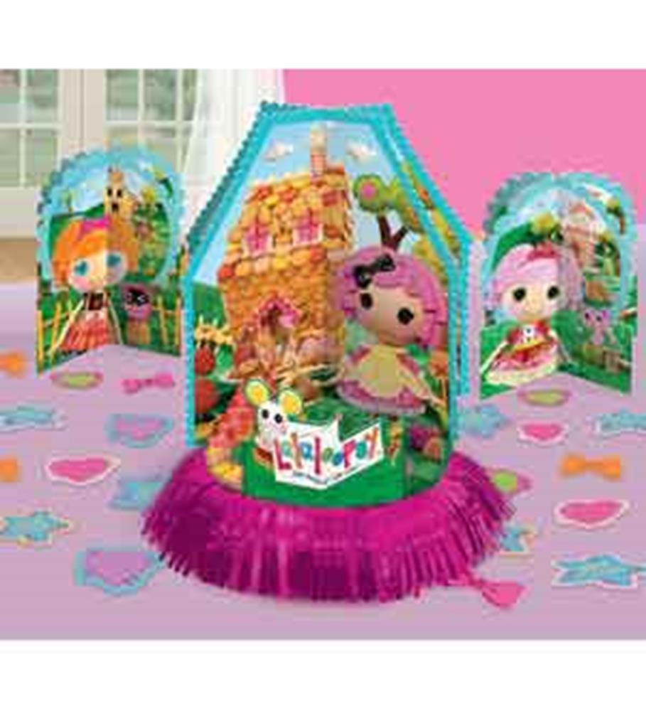 Colorful Lalaloopsy-themed paper table centerpiece with fringed purple base and cartoon character designs.