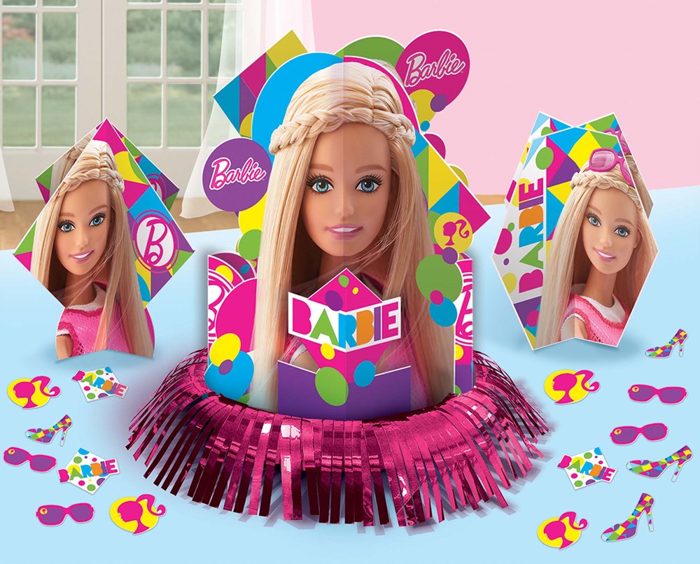Barbie-themed centerpiece with blonde doll figure, pink fringe base, and colorful Barbie logo accents.