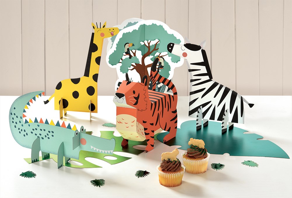Animal-themed birthday kit featuring colorful 3D giraffe, zebra, tiger, crocodile, and tree centerpieces.