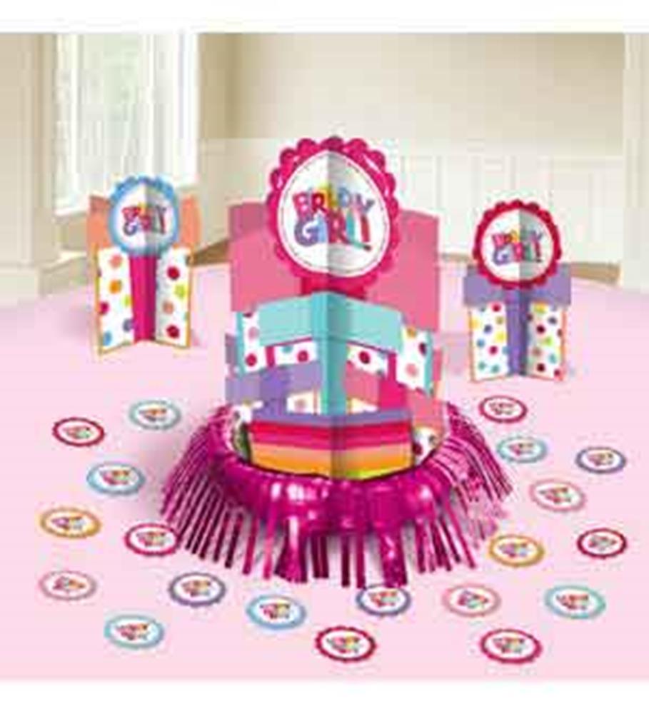 Pink and purple paper centerpiece with "Birthday Girl" sign and scattered round confetti decorations.