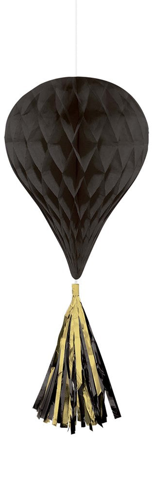 Black tissue paper tassel ball with honeycomb texture and gold-tipped tassel hanging below.