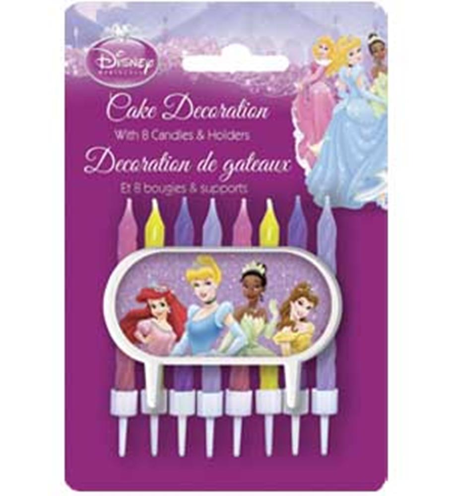 Set of eight Disney Princess-themed cake candles with white bases and yellow and purple flames on purple packaging featuring .