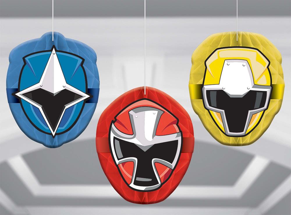 Three hanging Power Ranger-themed piñatas in blue, red, and yellow with bold black and white superhero mask designs.
