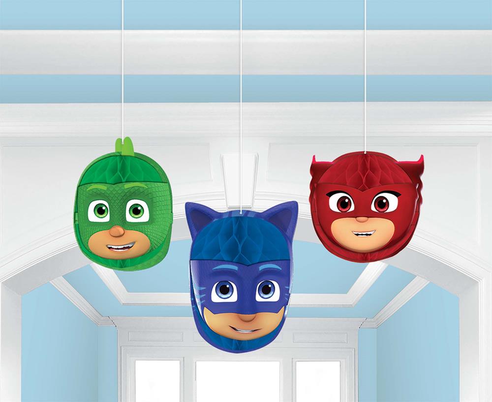 Hanging circular decorations featuring PJ Masks characters in green, blue, and red with smiling faces.