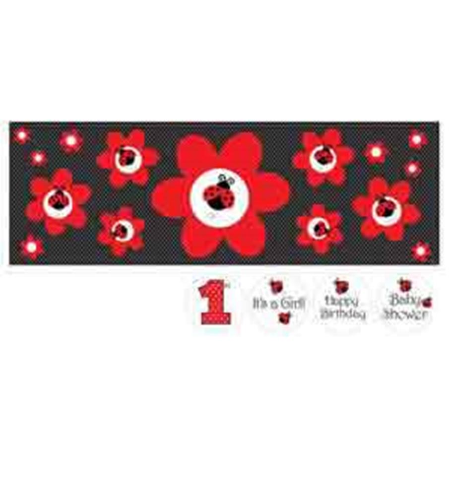 Black party banner with large red flowers featuring white centers and ladybug graphics, designed for girls' birthday.