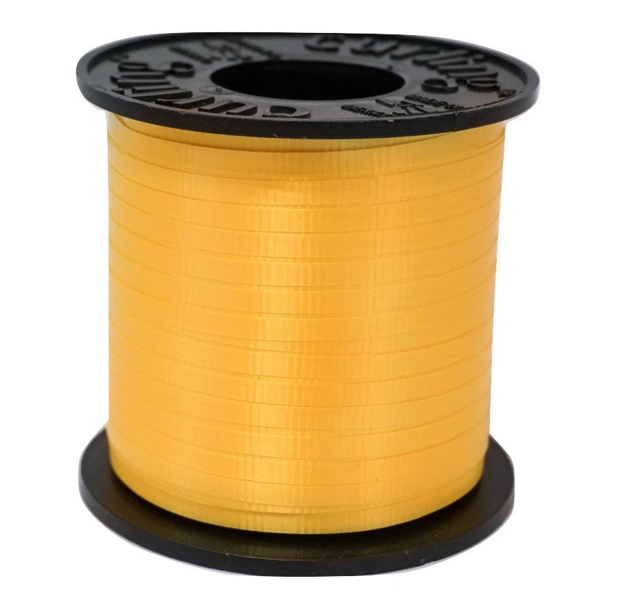 Bright yellow curling ribbon spool with black plastic edges, glossy finish, tightly wound.