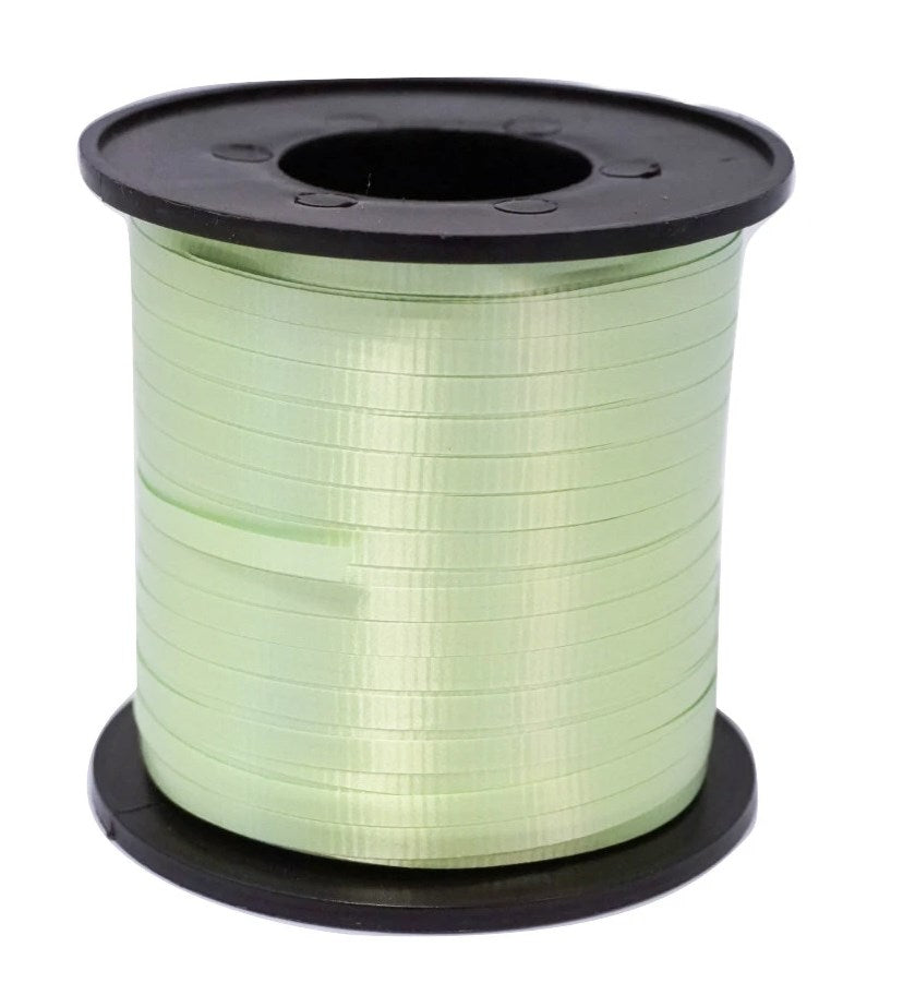 Neon green narrow curling ribbon wound on a black plastic spool.