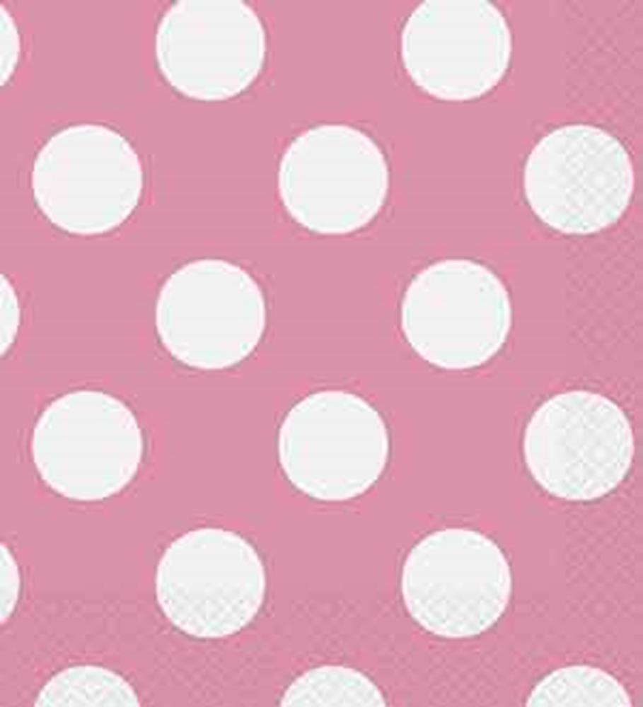 Hot pink paper napkin with evenly spaced large white polka dots, textured edges.