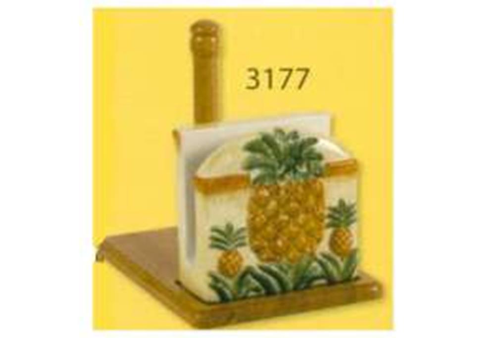 Wooden towel holder with gold pineapple-shaped top and white towels featuring a pineapple print.