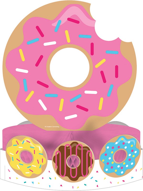 Pink frosted donut centerpiece with colorful sprinkles and a bite taken out, displayed on a box featuring yellow, chocolate,