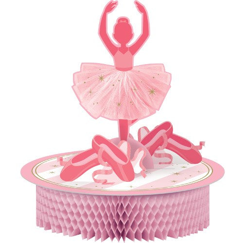 Pink ballerina centerpiece with a tutu and ballet slippers on a round honeycomb base.