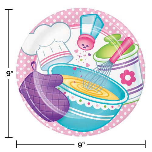 Round kids’ plate with pink polka dot border, chef hat, whisk, mixing bowl, oven mitt, and spice shaker illustrations.