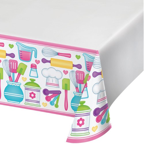 White rectangular tablecover with pink border featuring colorful cartoon kitchen utensils and chef hats design.