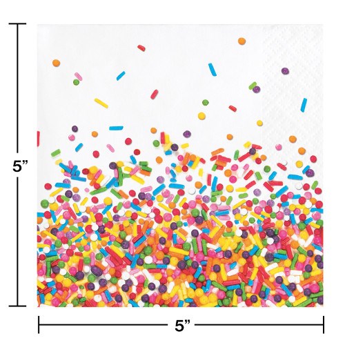 White napkin with colorful confetti-like sprinkles scattered densely at the bottom and sparingly upwards, 5x5 inches.